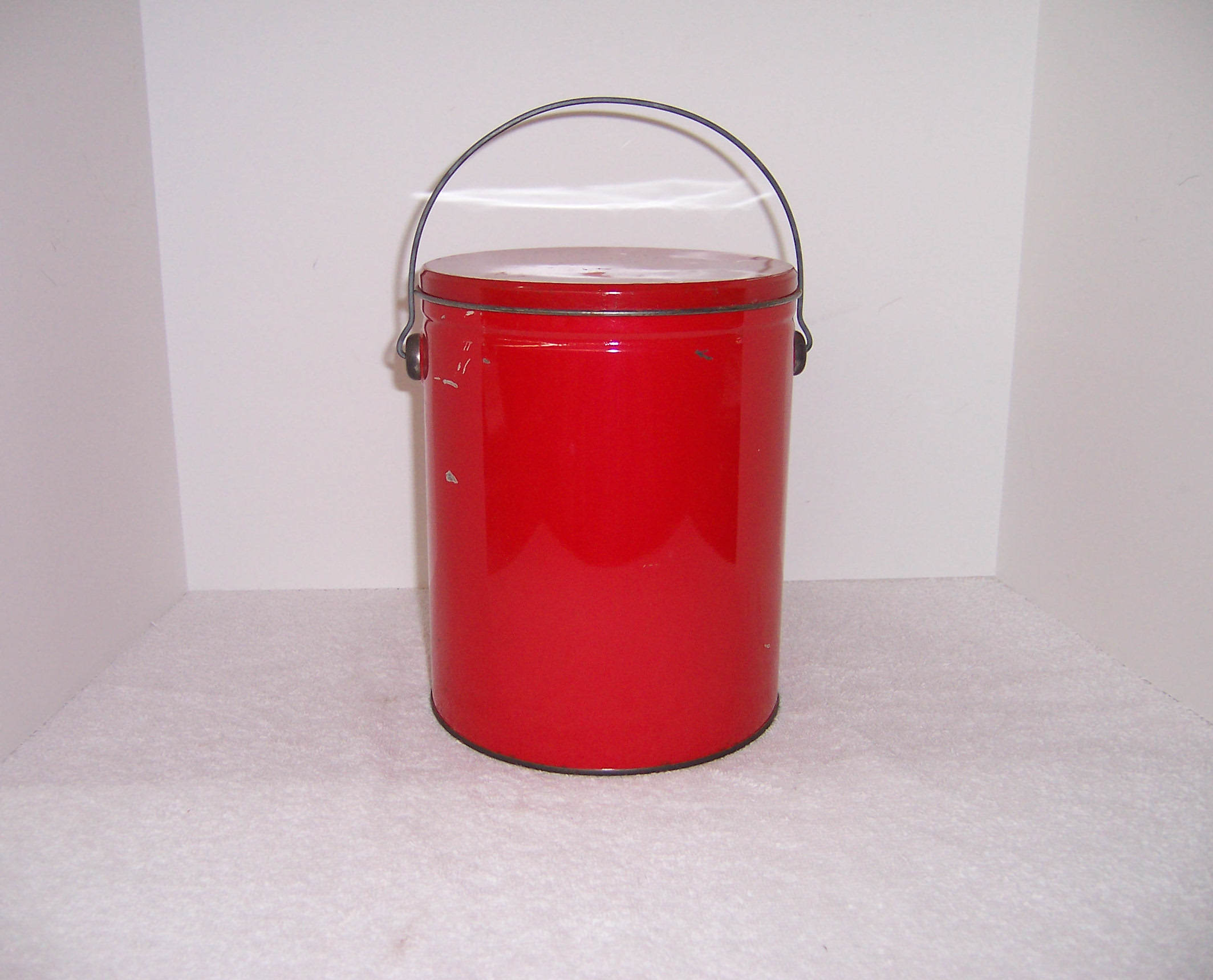 red tin container