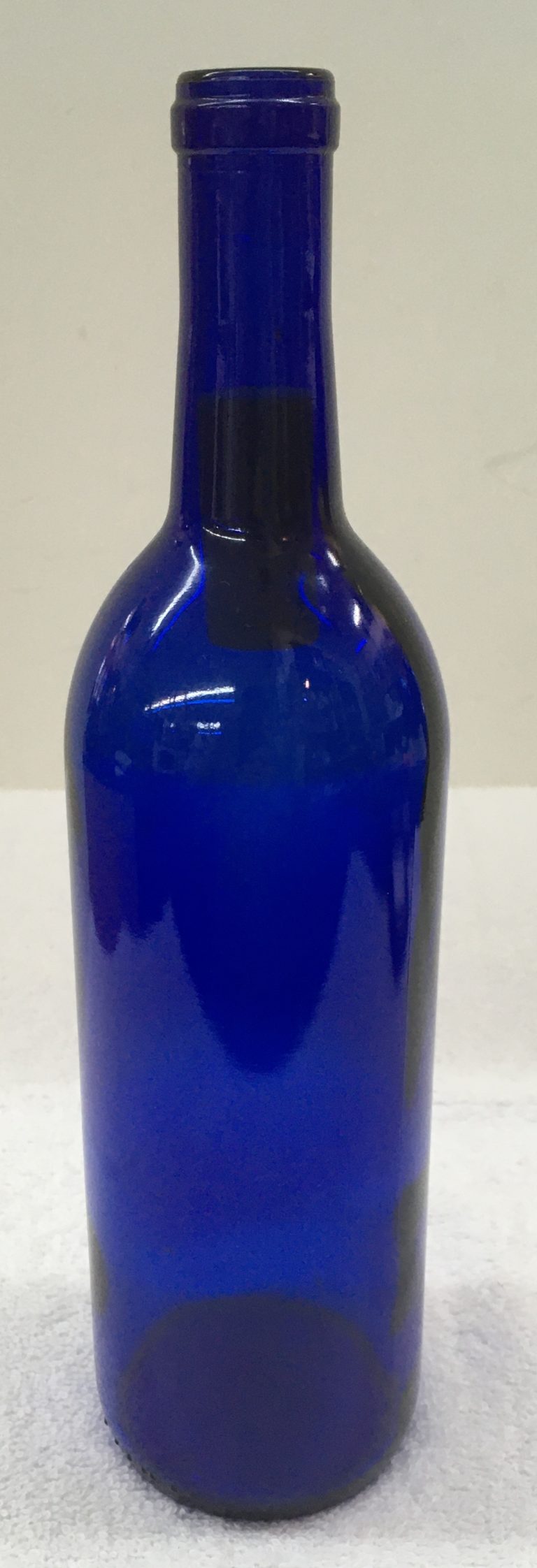 cobalt blue glass bottles        
        <figure class=